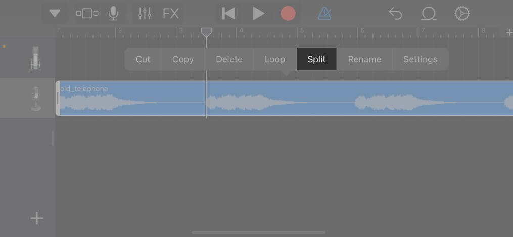 Double tap on song and select Split on iPhone